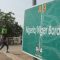 Papan penanda di perbatasan Niger & Nigeria. (Kola Sulaimon /aljazeera.com)